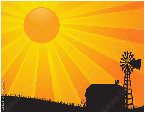 A vector illustration of a barn and windmill of a farm in silhouette against a rising or setting bright orange sun