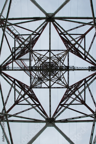 Figure of electric tower on sky background