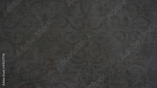 Old black anthracite vintage shabby patchwork tiles stone concrete cement wall texture background 