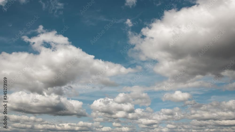 Timelapse of beautiful blue sky with white cumulus clouds. 4k footage of nature weather. Cloudscape background. Timelapse of beautiful blue sky with white cumulus clouds. 4k footage of nature weather. Cloudscape background.