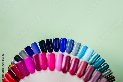 advertising  marketing for beauty salon  beauty shop.Manicurist  Testers nail Polish. Shiny gel lacquer. Nail art design wheel. gel polish on tips. Equipment and inventory of a manicure cabinet