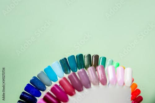 advertising  marketing for beauty salon  beauty shop.Manicurist  Testers nail Polish. Shiny gel lacquer. Nail art design wheel. gel polish on tips. Equipment and inventory of a manicure cabinet