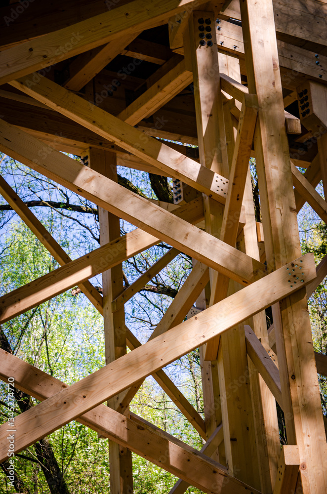 Fototapeta premium skeleton of a wooden bridge in the park