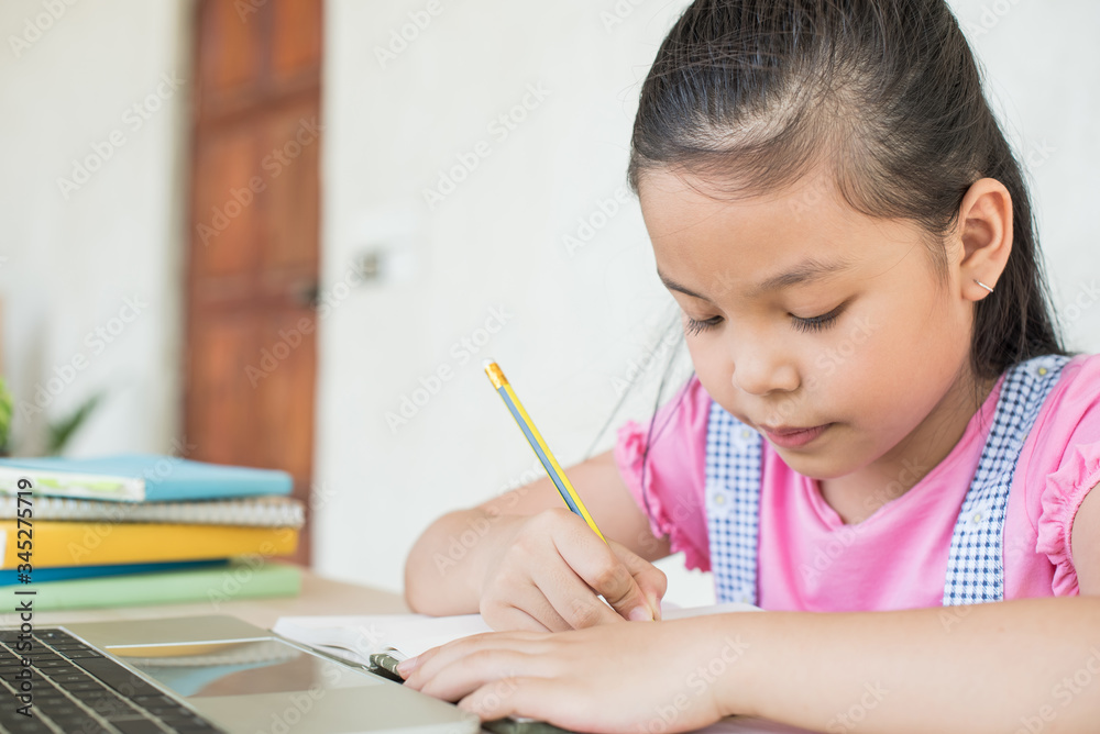 asian girl student online learning study online with video call teacher. social distance during quarantine, self-isolation, online education concept, homeschool, stay at home entertainment. asian girl student online learning study online with video call teacher. social distance during quarantine, self-isolation, online education concept, homeschool, stay at home entertainment.