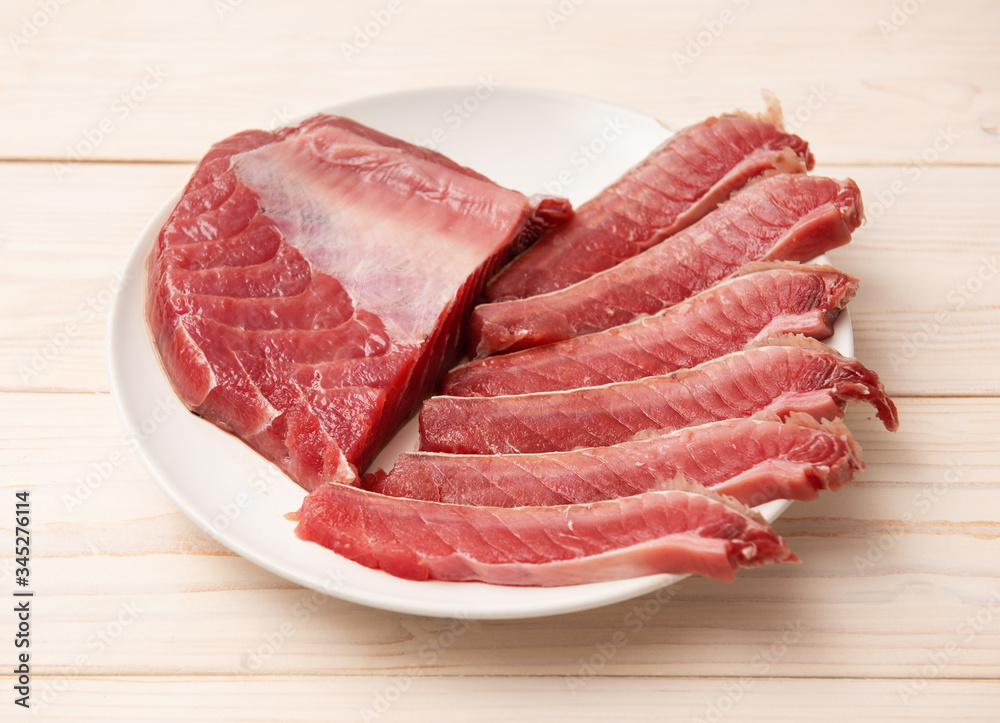 Close up view of a raw tuna steak Close up view of a raw tuna steak