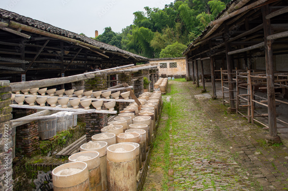 Clay pottery drying in old traditional pottery workshop in Jingdezhen, China