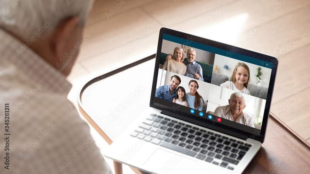 Close up of elderly man talk speak with diverse relatives on video call using modern tablet quarantine at home, mature grandfather have online web conversation conference with family on computer Close up of elderly man talk speak with diverse relatives on video call using modern tablet quarantine at home, mature grandfather have online web conversation conference with family on computer