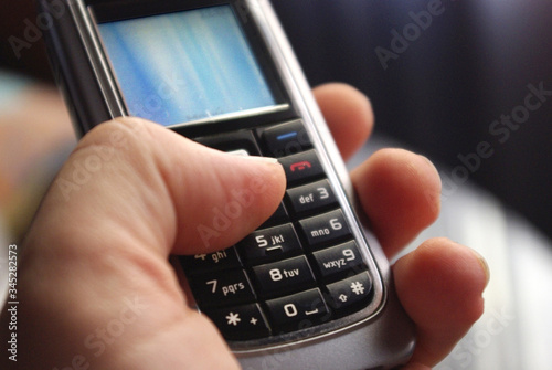 A phone call to stay connected, a mobile in hand