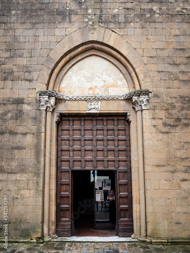 Imposing portal from the church of San Francesco in Pienza, Italy, dating back to 1200.
