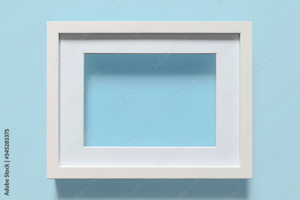White frame on light blue background