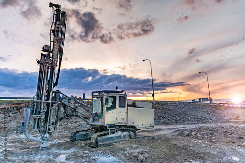 Professional drilling rig doing a geotechnical study of the terrain photo