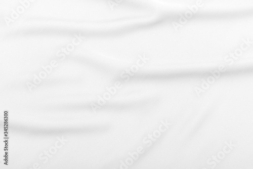 White fabric  cloth soft waves texture background. Soft image.