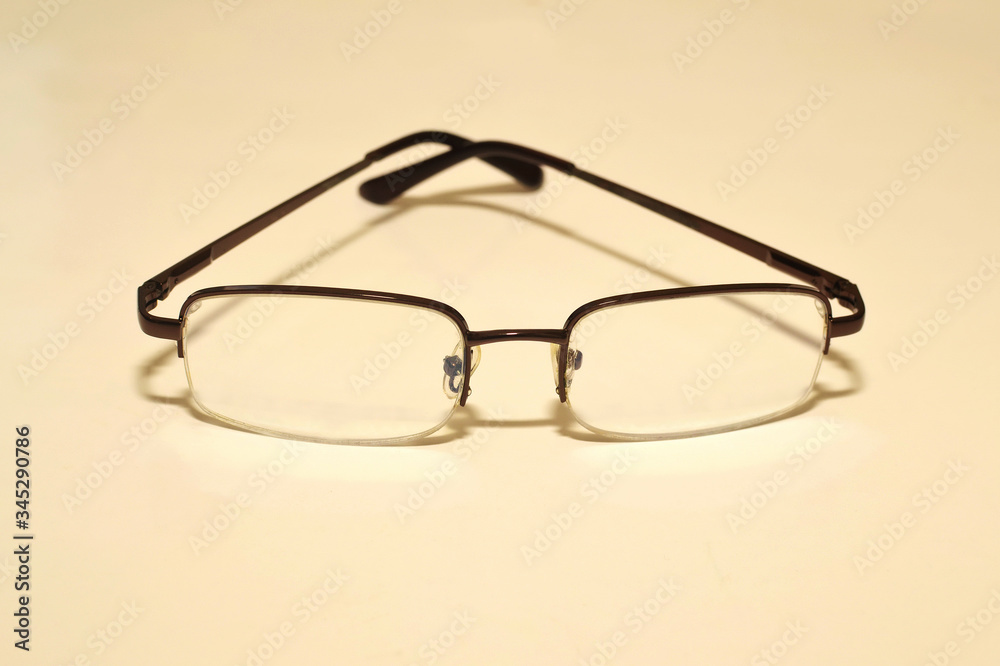 Comfortable stylish glasses to improve vision on a white background close-up