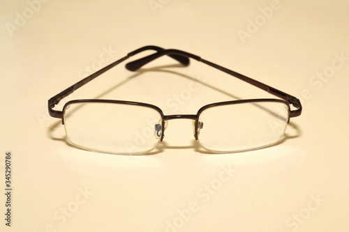 Comfortable stylish glasses to improve vision on a white background close-up
