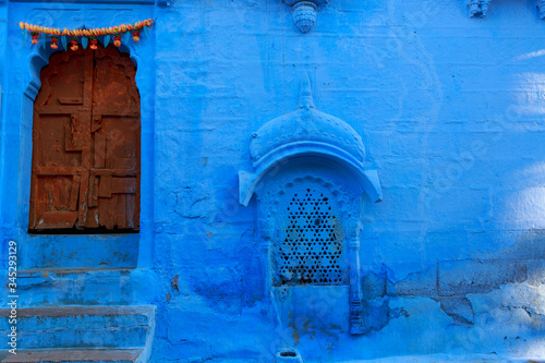 Blue door in blue city © Gil K