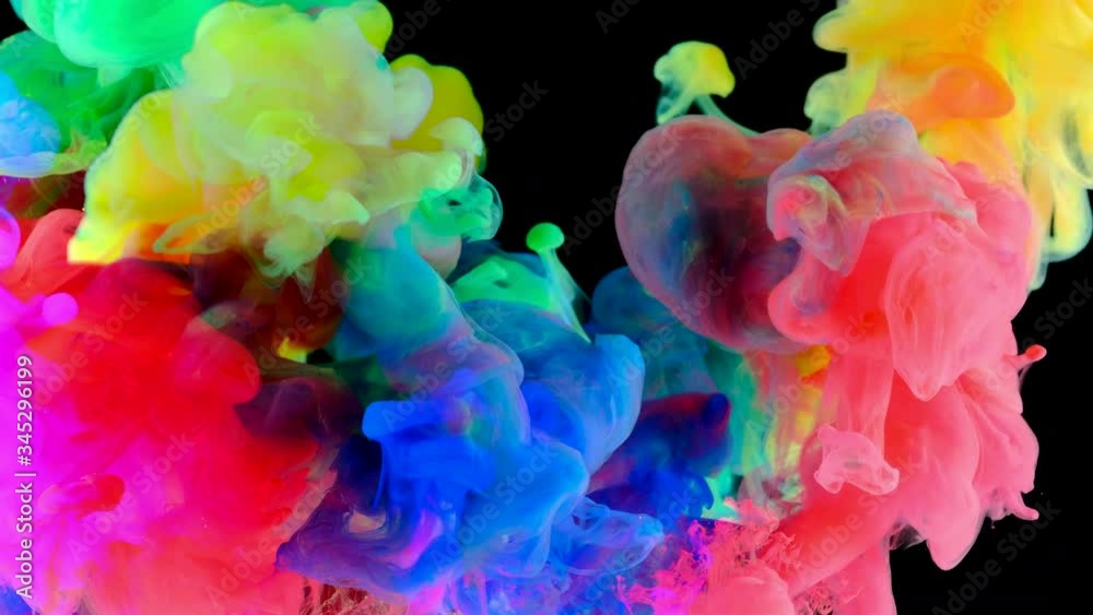 Color paint drops in water , abstract color mix , drop of Ink color mix paint falling on water Colorful ink in water, 4K footage,
