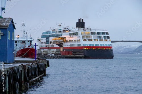 The coast passenger ships arrive at the port of Sortland in the county of Nordland photo