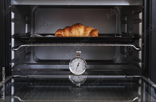 Fresh baked Croissant in oven
