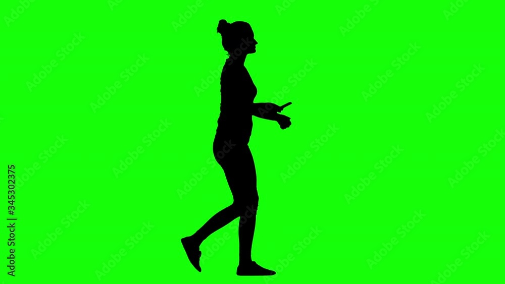 Woman Texting on The Phone While Walking Green Screen Silhouette Woman Texting on The Phone While Walking Green Screen Silhouette