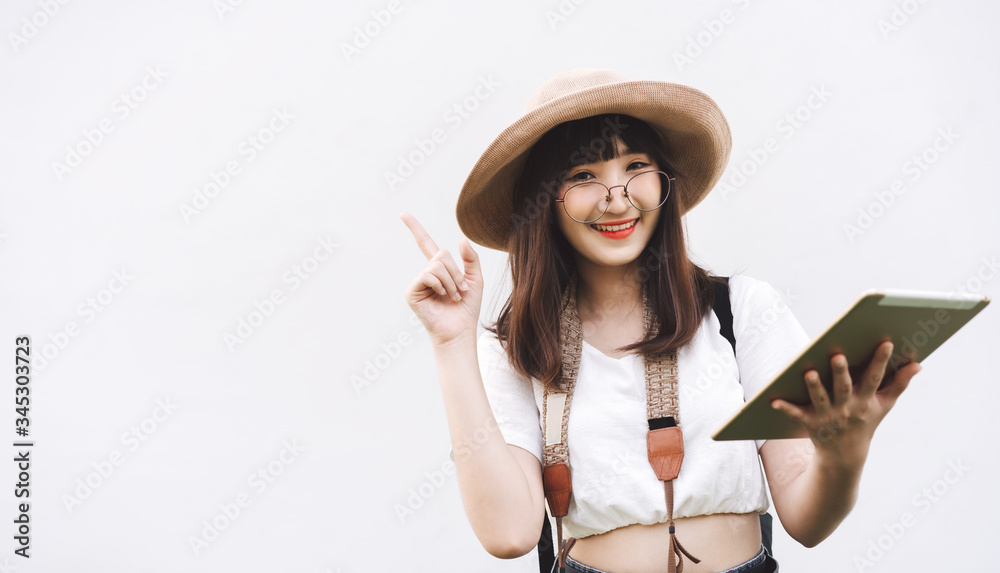 Young asian woman guide travel use tablet device for smart tour white background. Young asian woman guide travel use tablet device for smart tour white background.