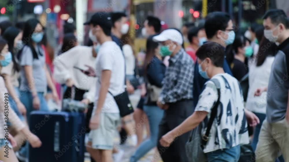 Slow motion of crowd people wearing medical face masks at metro in Hong Kong. Coronavirus concept Slow motion of crowd people wearing medical face masks at metro in Hong Kong. Coronavirus concept