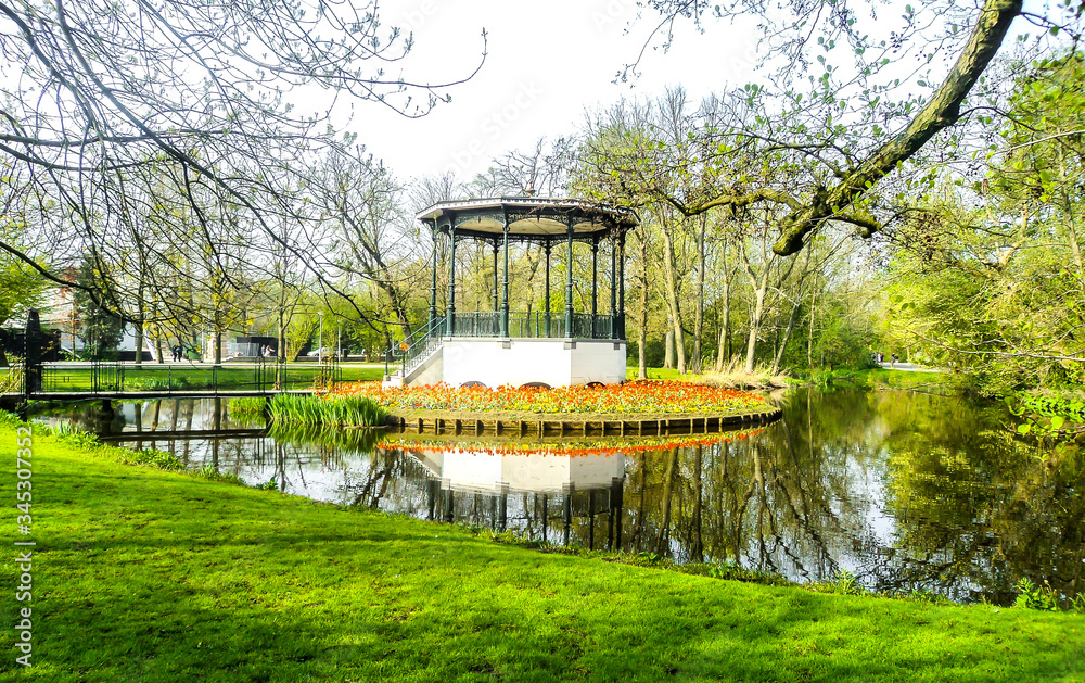 Gazebo and pond in Vondelpark, Amsterdam. The Netherlands.