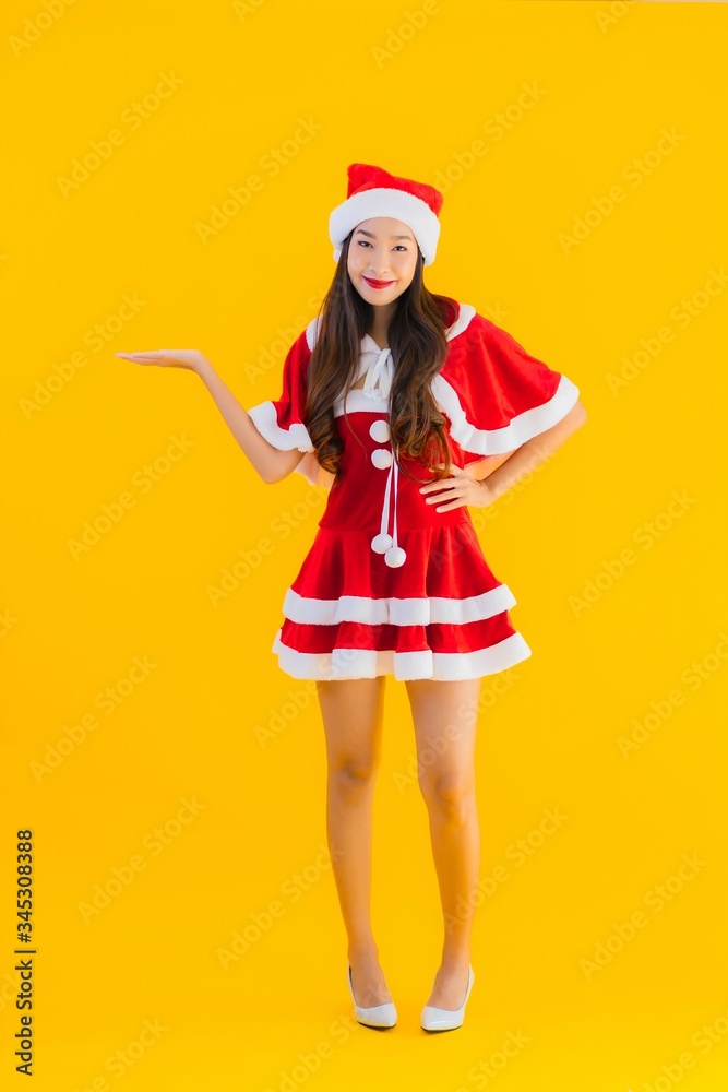 Portrait beautiful young asian woman christmas clothes and hat smile happy Portrait beautiful young asian woman christmas clothes and hat smile happy