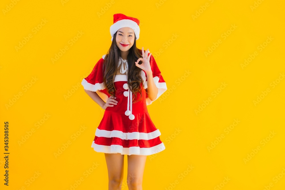 Portrait beautiful young asian woman christmas clothes and hat smile happy Portrait beautiful young asian woman christmas clothes and hat smile happy
