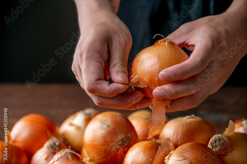 Peeling an onion.