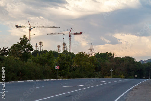 Construction cranes on the horizon