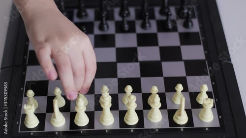 The child learns to play chess. Mental development of the child