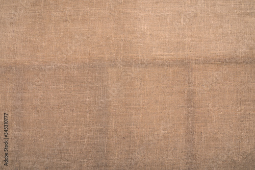 Brown sackcloth texture. or Background of Natural Brown Fabric Sack weaving is a bag. Vintage abstract Hessian or sackcloth fabric or hemp sack texture background.