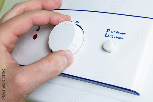 Water heater temperature hand adjusting