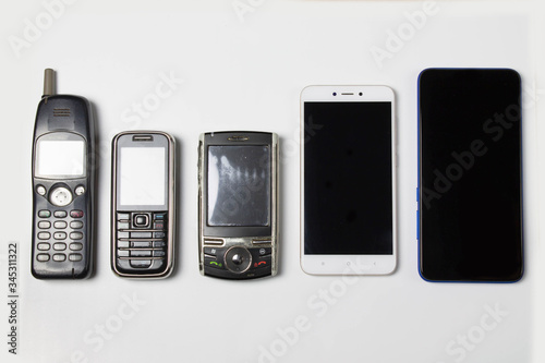Evolution of cell phones on white background