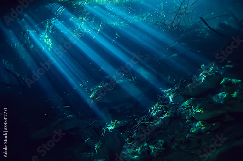 underwater landscape mexico  cenotes diving rays of light under water  cave diving background