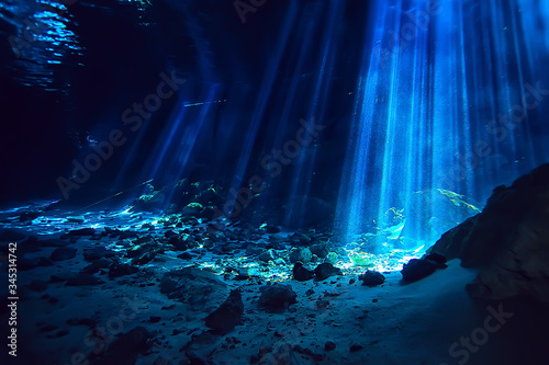 underwater landscape mexico, cenotes diving rays of light under water, cave diving background © kichigin19