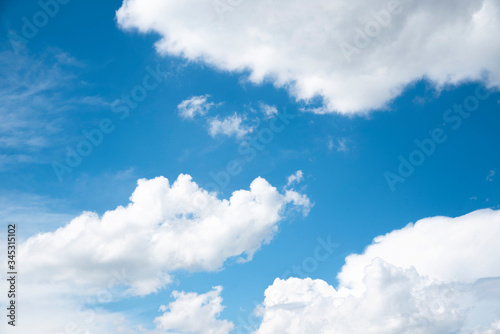 Beautiful blue sky and close-up white clouds.  Nature background.