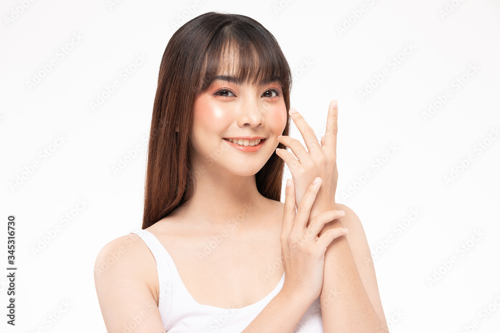 Young Beautiful Asian woman smile holding hands with clean and fresh skin Happiness and cheerful with positive emotional,isolated on white background,Beauty Cosmetics and spa Treatment Concept Young Beautiful Asian woman smile holding hands with clean and fresh skin Happiness and cheerful with positive emotional,isolated on white background,Beauty Cosmetics and spa Treatment Concept