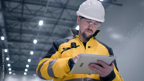 Architect or engineer working, browsing building project indoor of construction site with blueprint plan. businessman worker, man male construction engineers or architects working people. Engineer In