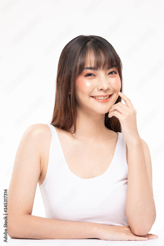 Young Beautiful Asian woman smile touching soft cheek with clean and fresh skin Happiness and cheerful with positive emotional,isolated on white background,Beauty Cosmetics and spa Treatment Concept Young Beautiful Asian woman smile touching soft cheek with clean and fresh skin Happiness and cheerful with positive emotional,isolated on white background,Beauty Cosmetics and spa Treatment Concept