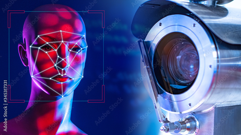 CCTV. Face recognition system. Concept camera with human identification  function. Face recognition systems. Concept - big brother. Lines on the face  of a man. CCTV camera on a dark background Stock Photo