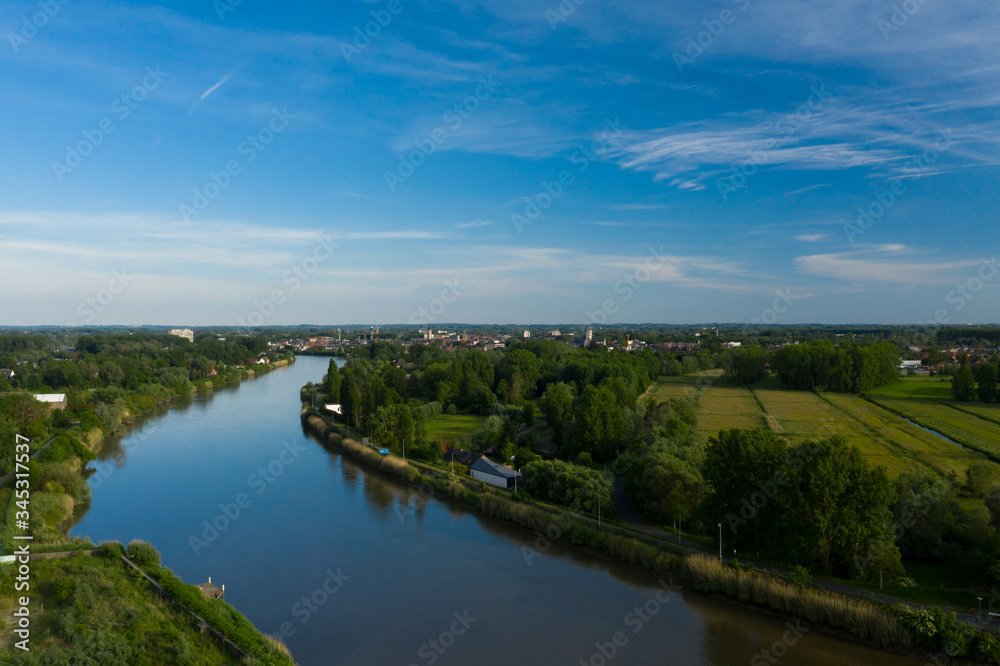 Aerial view of the Scheldt river, in Grembergen, Belgium