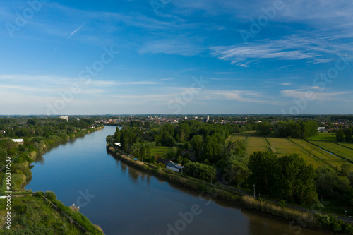 Aerial view of the Scheldt river, in Grembergen, Belgium © Catalin