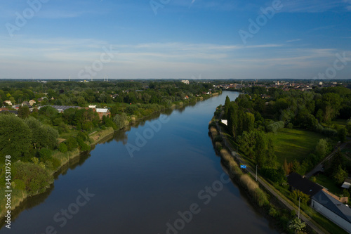 Aerial view of the Scheldt river, in Grembergen, Belgium