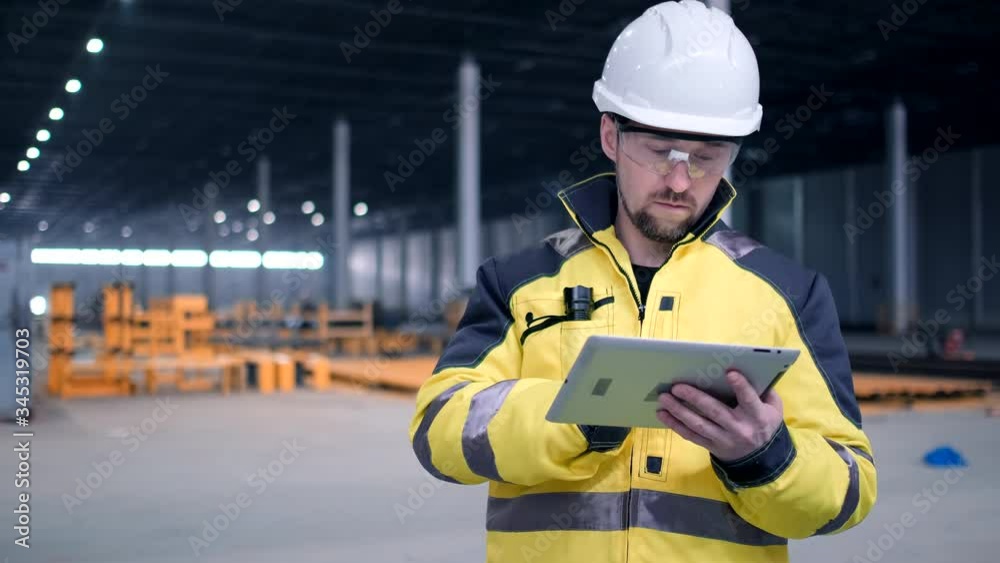 Architect or engineer working, browsing building project indoor of construction site with blueprint plan. businessman worker, man male construction engineers or architects working people. Engineer In