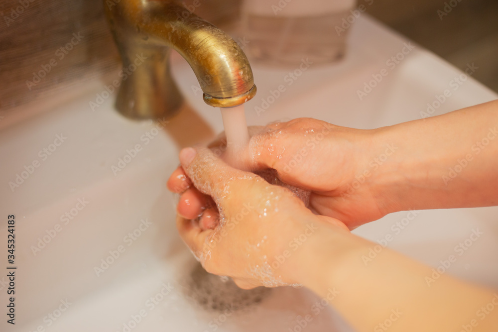 Fototapeta premium Hand wash with soap, cleanliness and hygiene 