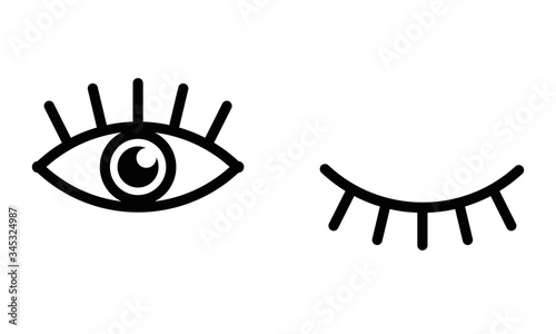 Eye icon. Hand drawn eye vector icon. Open and winking eyes on white background.