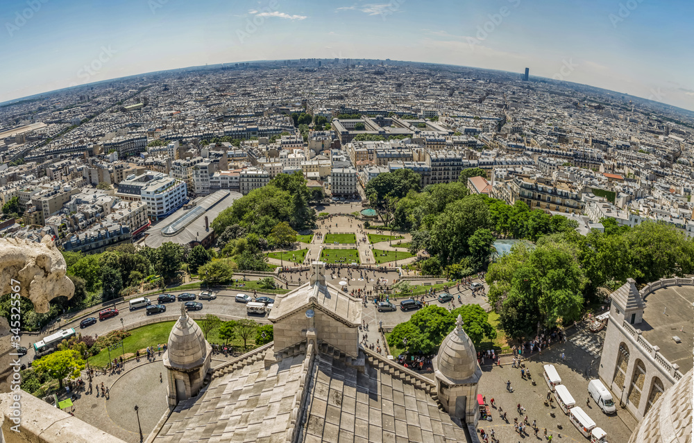 PARIS, FRANCE - JUNE 23, 2016: Super wide panorama. Aerial view from Basilica of the Sacred Heart of Jesus stands at the summit of the butte Montmartre - highest point in the Paris