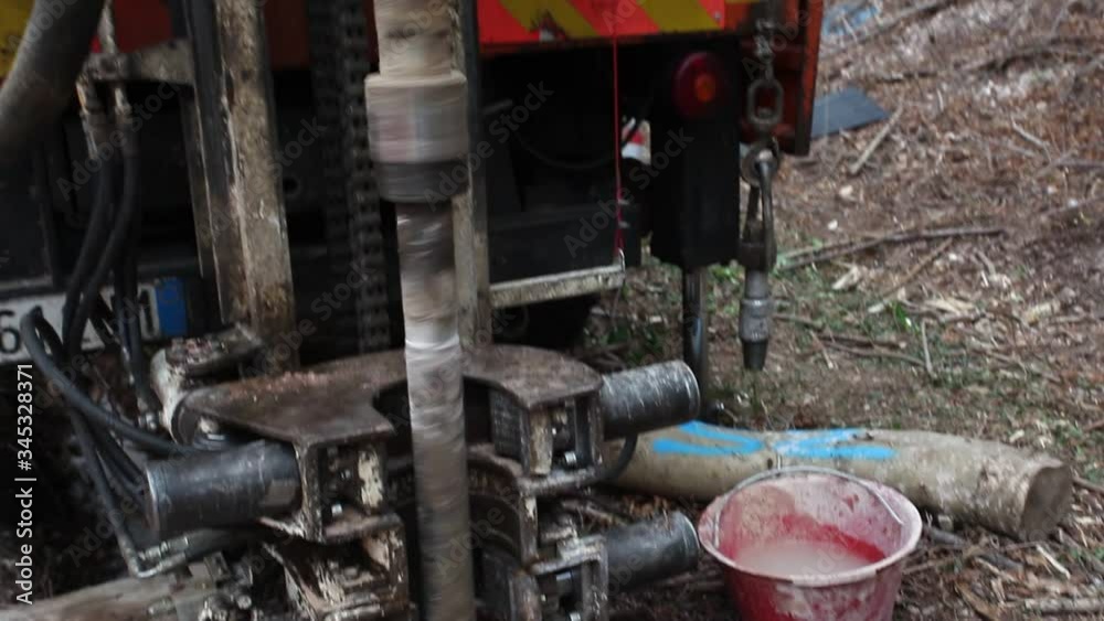 Truck with drilling machinery in action for geognostic probing. Concept: industrial activity for oil, water, gas research