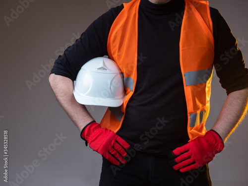 A construction worker in an...